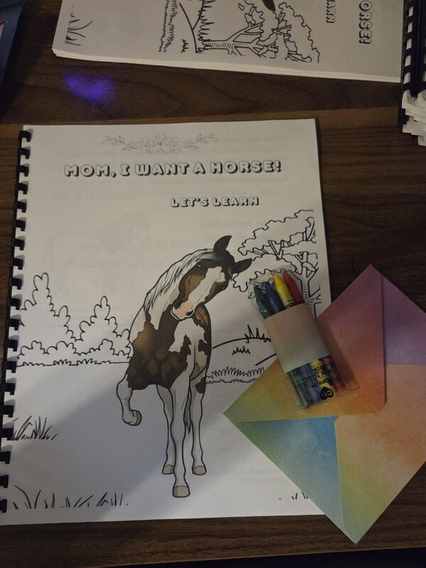 The Mom, I Want a Horse activity book, open to a coloring page of Steele